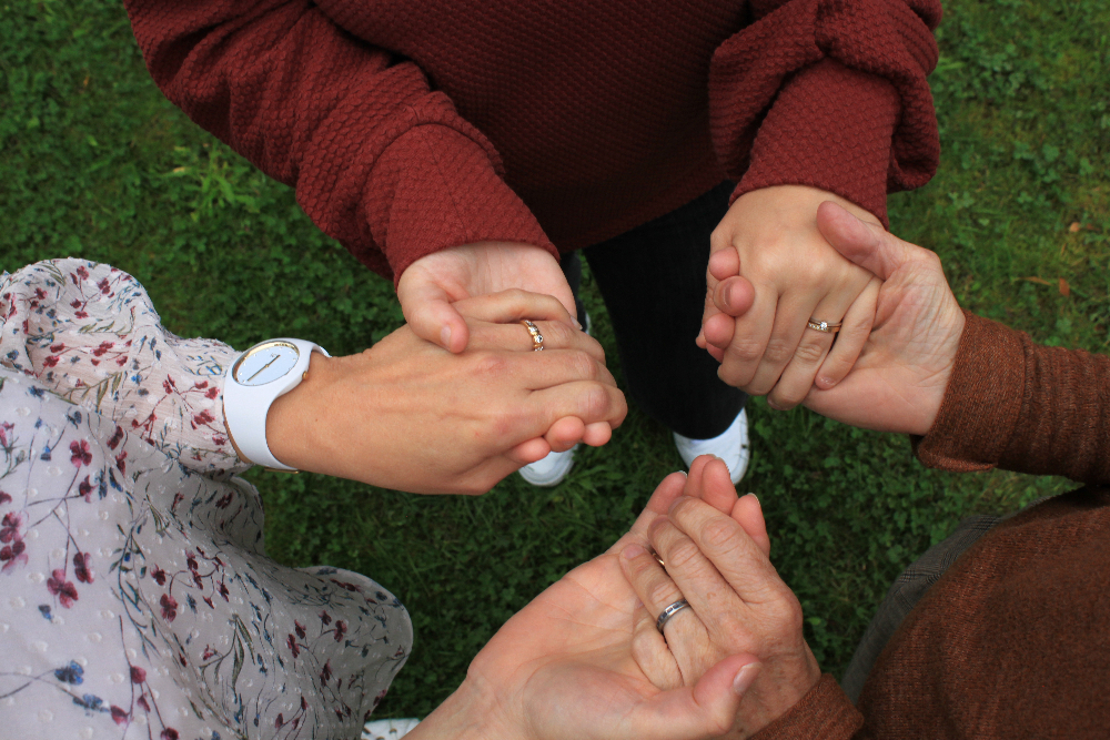 3 sets joined hands